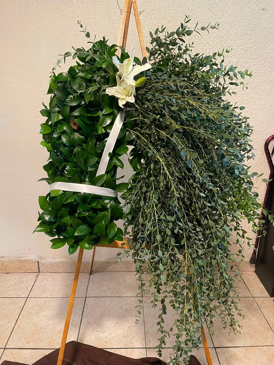 Corona funebre en forma de caballo